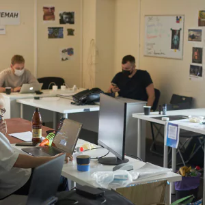 Digital Nomad Thriving in Coworking Office