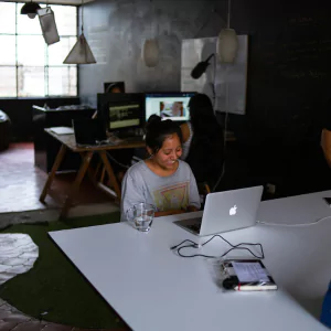 Digital Nomad Thriving in Coworking Office